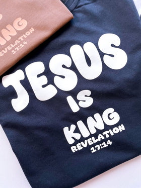 Navy kids Jesus Is King bubble tee close-up | WORDOFGOD Apparel