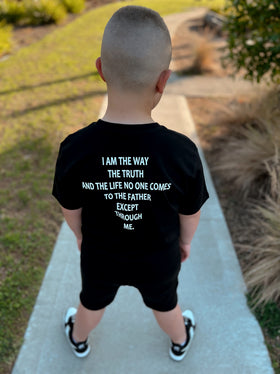 Back view of the I Am The Way, The Truth and The Life kids tee outdoors | WORDOFGOD Apparel