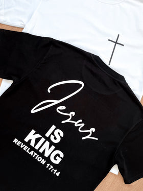 Close-up of the Jesus Is King script print on the black tee | WORDOFGOD Apparel