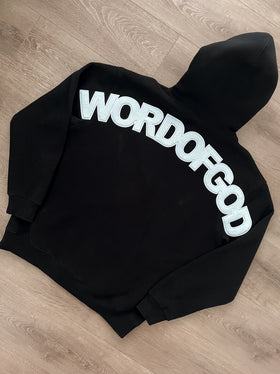 Close-up of the arched WORDOFGOD print on the back of the black hoodie | WORDOFGOD Apparel