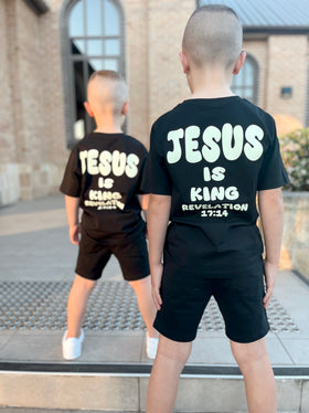 Two boys showing the Jesus Is King bubble font print on the back | WORDOFGOD Apparel