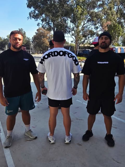 Three men wearing WORDOFGOD tees