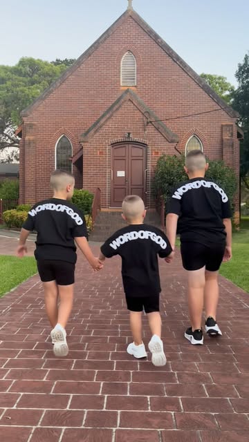 Kids in WORDOFGOD tees at church