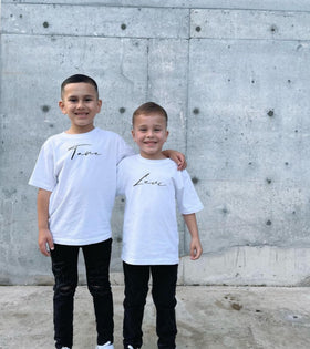 Two boys wearing white personalised custom name tees | WORDOFGOD Apparel